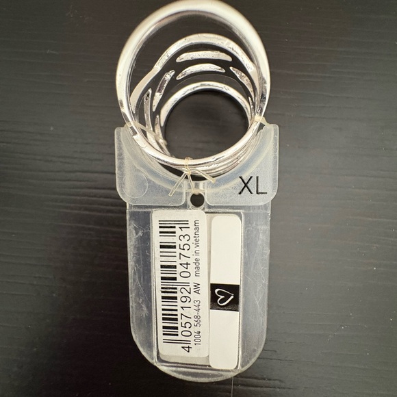 Silver tone multi band wrap around ring. Size XL. New. - Picture 4 of 5